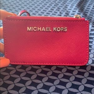 Michael Kors change purse.
